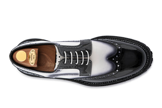 Derby in paint and leather