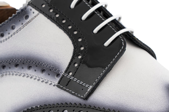 Derby in paint and leather