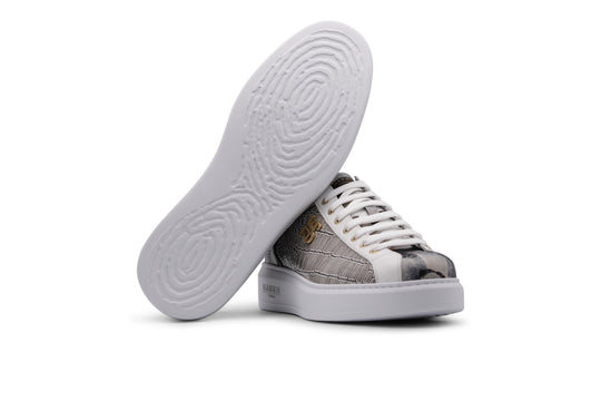 Sneakers in printed leather with a rubber sole.