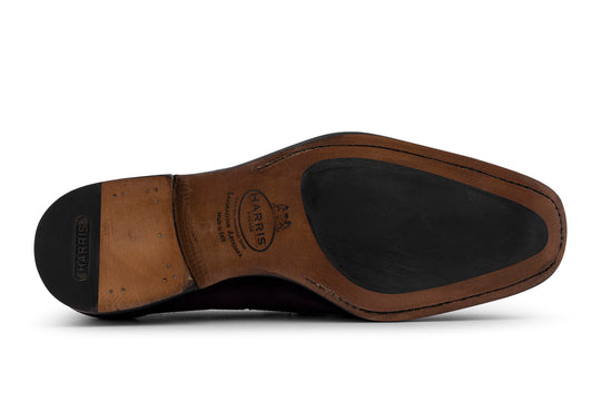 Moccasin with pom pom in hand-shaded suede