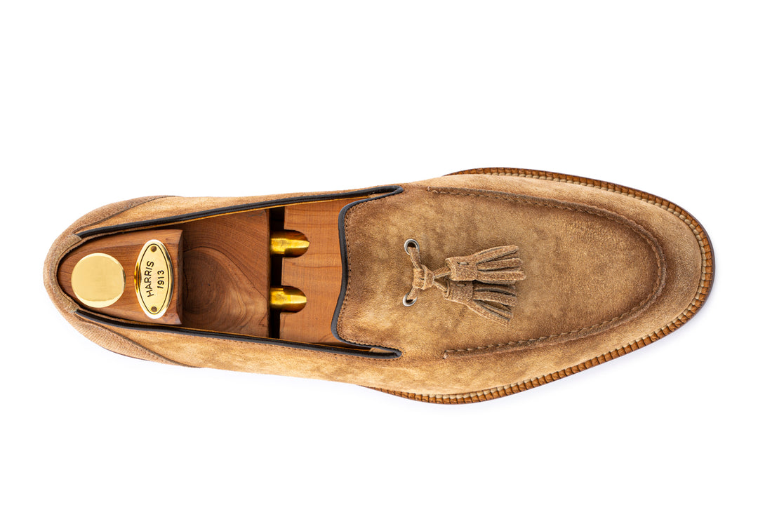 Mocassino in suede nuvolato con pon pon