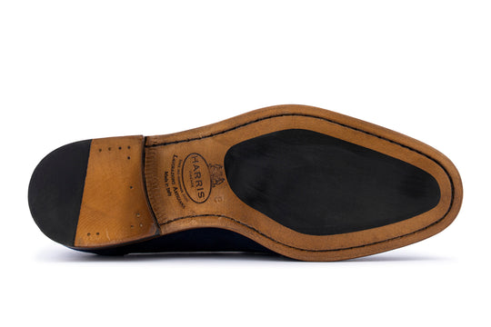 Mocassino in suede con pon pon