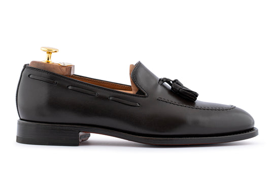 Mocassino in pelle con pon pon