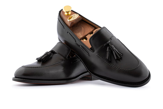 Mocassino in pelle con pon pon