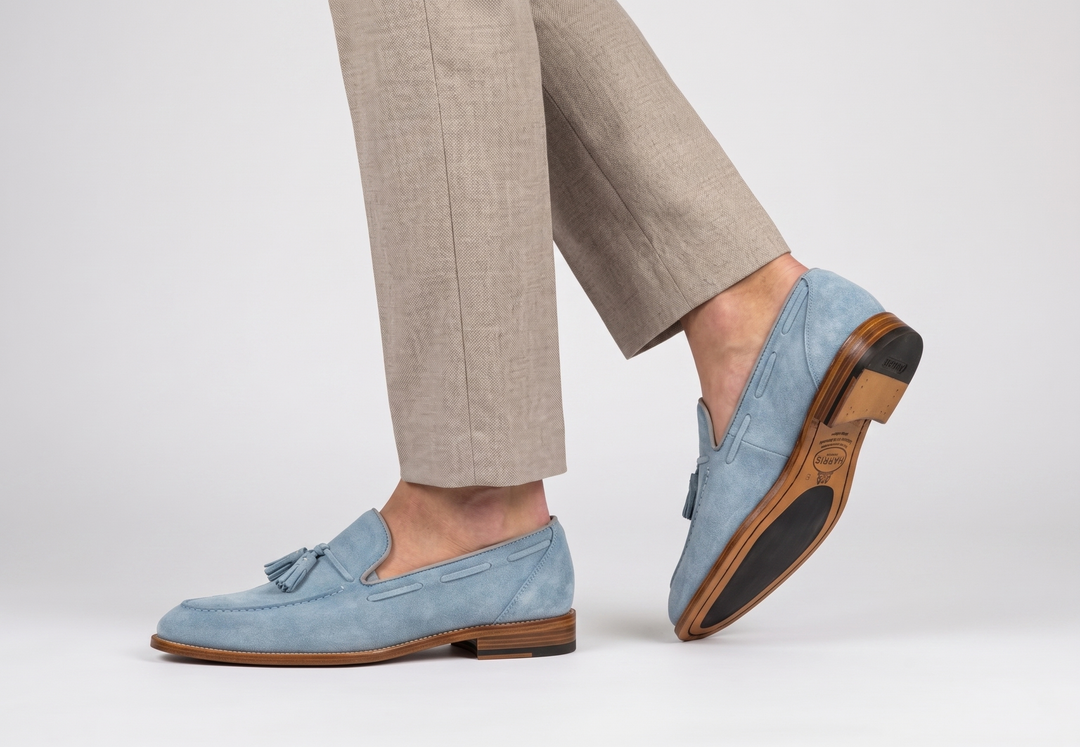 Mocassino in suede con pon pon