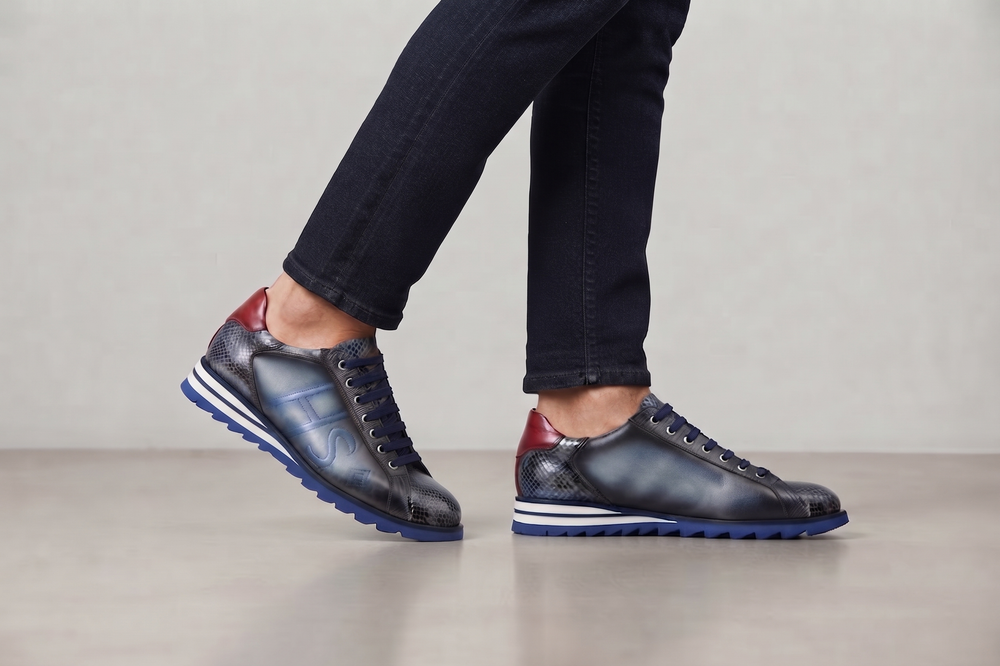 Sneakers in suede e pitone con cuciture imbottite