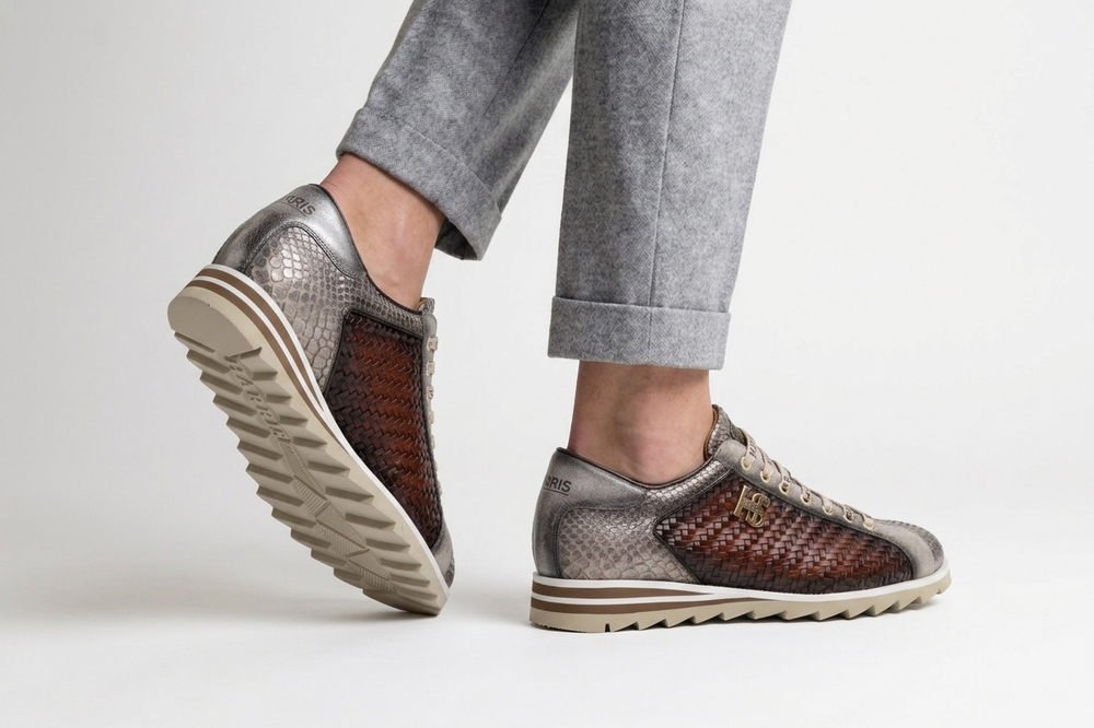 Zapatillas deportivas en piel tejida y pitón.