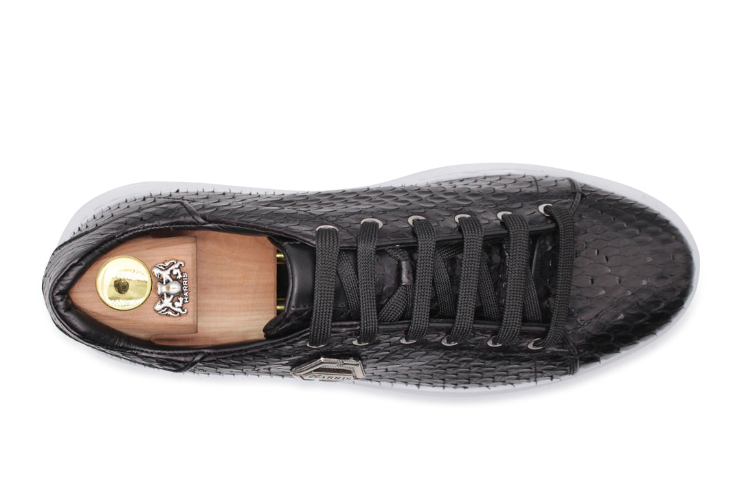 Sneaker nera in pelle di pitone