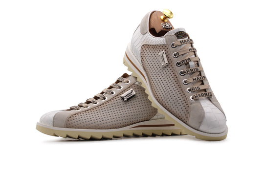 Sneakers in pelle traforata ed effetto coccodrillo
